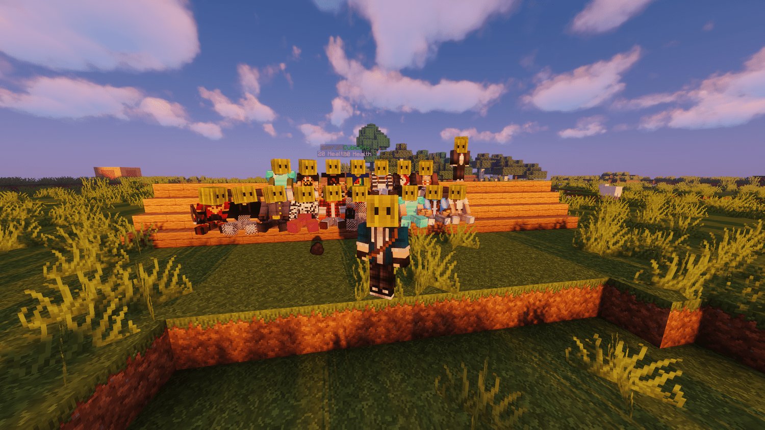 Silver Springs players wearing pumpkin heads pose together on wooden benches