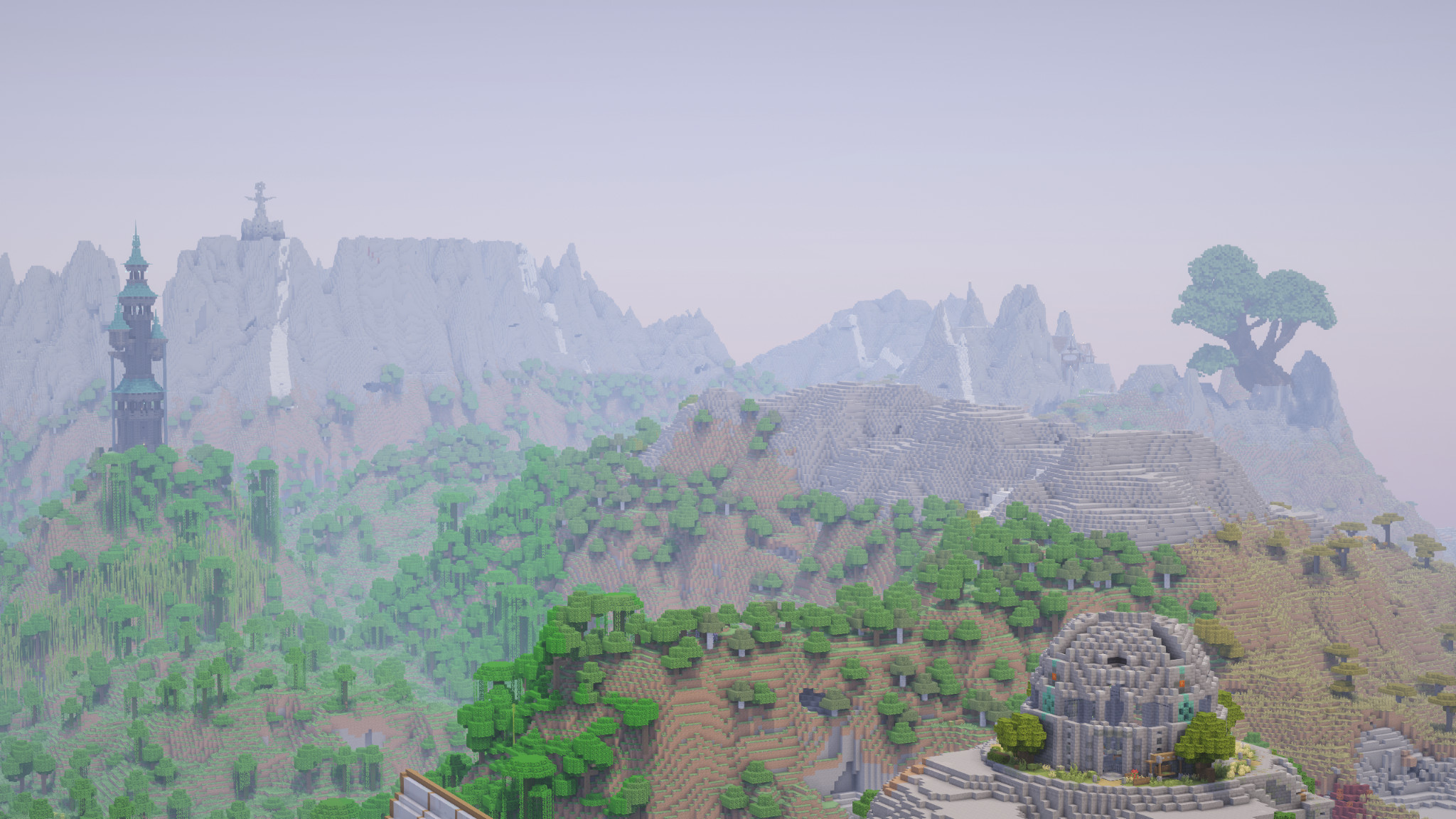 various player builds across the landscape. in the foreground, a dome-shaped player build, further back we find a large dark tower with a green pointy roof. even further back we find a large statue atop a tall mountain, and further down the mountain is a huge player made tree